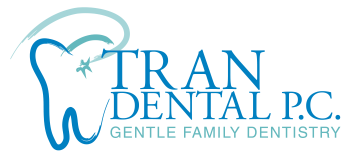 New Tran Dental Logo with a drawing of a teeth in a blue stroke